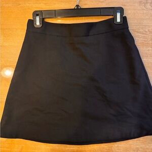 Women’s Express black miniskirt size 4 gold zipper on the back